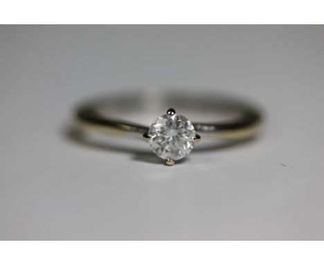 DIAMOND SOLITAIRE RING - stunning brilliant cut diamond solitaire (marked 0.44ct) in an 18ct white gold ring. Near colourless