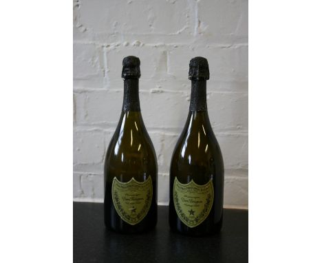 CHAMPAGNE - 2 75cl bottles of Dom Perignon 2002 Vintage champagne. Labels and seals in good condition.