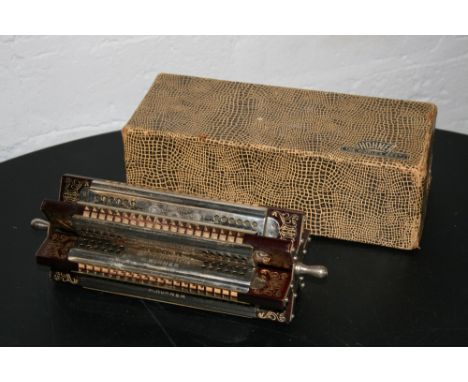 HOHNER SEXTET HARMONICA - a rare boxed Hohner paddle wheel tremolo harmonica.