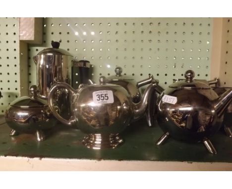 SHELF OF PLATED TEA POTS, COFFEE POT ETC