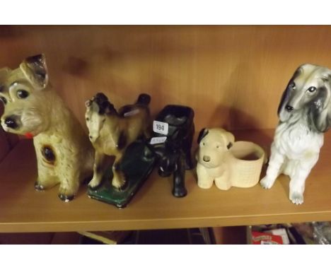 SHELF OF ANIMAL ORNAMENTS