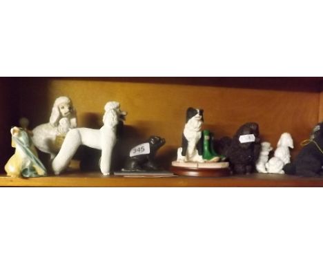 SHELF OF DOGGY ORNAMENTS