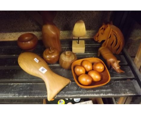 PART SHELF OF TREEN ORNAMENTS, HORSES HEAD, RHINO &amp; A FISH ETC