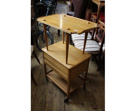 A vintage teak hostess trolley together with a folding teak table