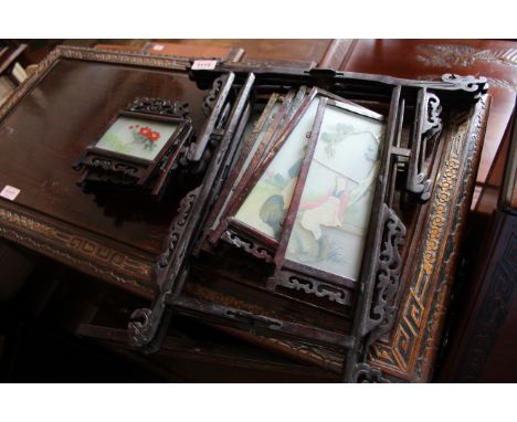 A Chinese lacquered hanging lantern with decorated glass panels
