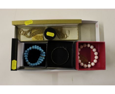 A gold on silver bracelet; two bead bracelets; a silver bangle; a sterling silver Scottish brooch and a pair of earrings