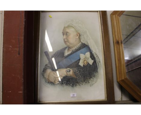 An oak framed coloured portrait print depicting Queen Victoria
