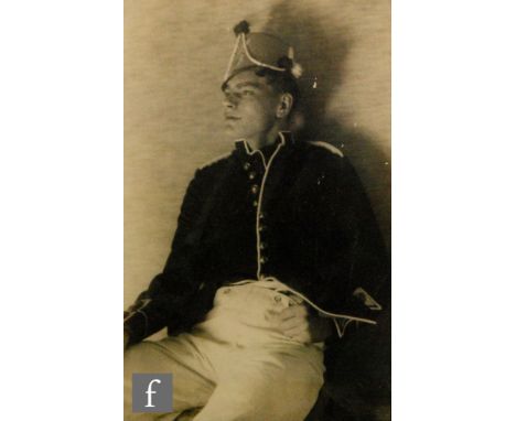 MONTAGUE GLOVER (1898-1983) - Portrait of Ralph wearing military tunic and breeches, monochrome photograph, framed, 22cm x 14