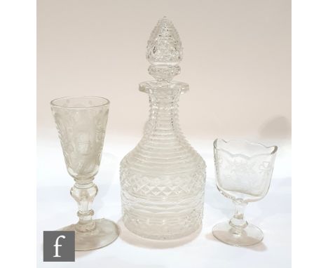 A 19th Century decanter with diamond cut body and facet cut neck below a hollow blown cut stopper, height 30cm, together with