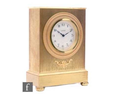 A 20th Century gilt mantle clock by Luxor in the Empire style on a stepped base and ball feet, height 19cm. 