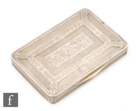 A continental silver cushioned rectangular box with engine turned and foliate engraved decoration to whole, length 8.5cm. 