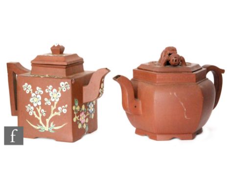 Two Chinese Yixing style teapots, the first of square section with arched spout and angular handle, enamelled with figural an