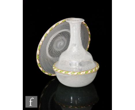 A 19th Century Clichy glass carafe of globe and shaft form with a fine white spiral line and applied cane work spiral band to