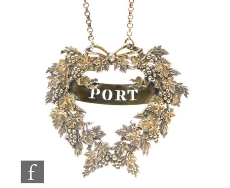 A George III silver gilt decanter label 'Port' decorated with a fruit vine border, length 7.5cm, London 1806 Digby Scott &amp