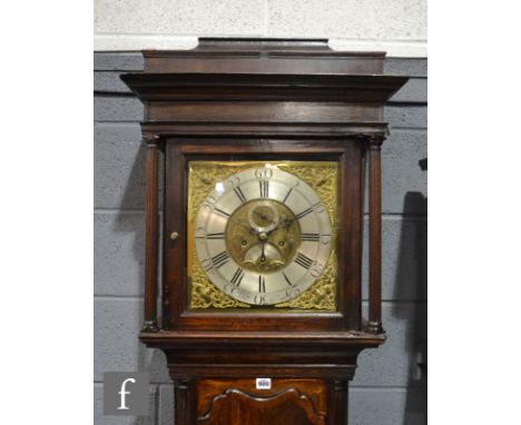 A 19th Century oak cased eight day strike long case clock, brass and silvered dial marked John Key, Warrington, below stepped