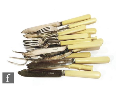 A set of six hallmarked silver bone handled fish knives and forks, Sheffield 1931, with a small silver toasting fork and a pi