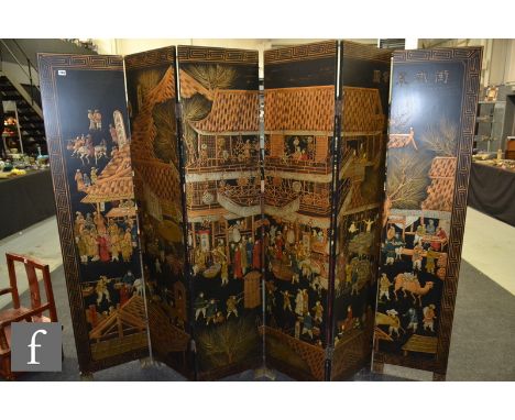 A 20th Century Chinese black lacquered six-fold screen, painted in gilt and polychrome enamels depicting Manchu life with fig