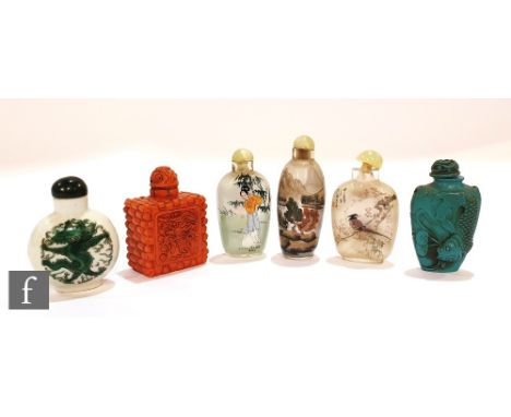 A collection of Chinese 20th Century snuff bottles to include three inside painted examples, all with green hardstone stopper