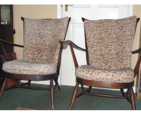 A PAIR OF ERCOL ARM CHAIRS FOR REFURBISHMENT.

84cm HIGH x 71cm ARM WIDTH x 38cm SEAT HEIGHT