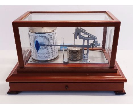 A CASSELLA BAROGRAPH IN GLASS CABINET WITH MANUAL &amp; CHARTS