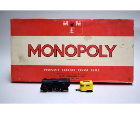 A vintage Monopoly board game set, together with a model horse box from the Matchbox Series by Lesney and a model train