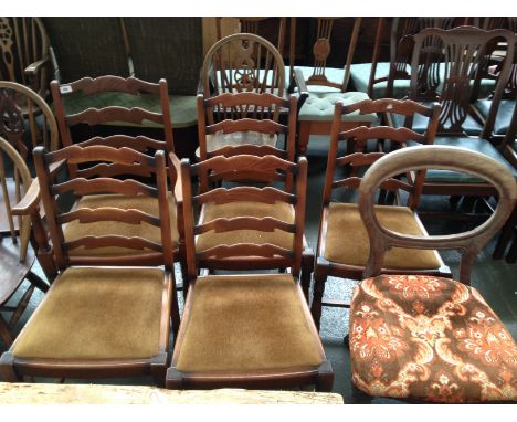 A set of five ladder-back chairs with one carver (6)