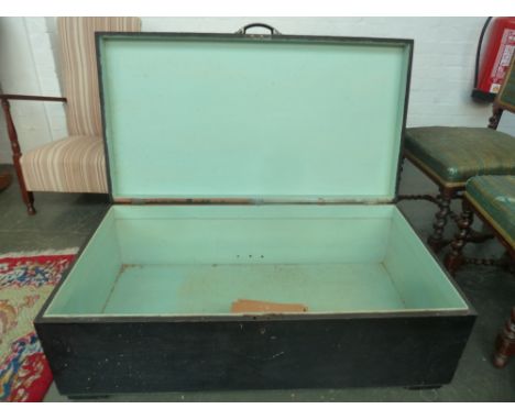 A large black wooden trunk with pale blue interior, 56 x 105 x 37cmH