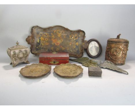 A box of interesting items to include a relief copper moulded biscuit barrel decorated with a battle scene, further Chinese m