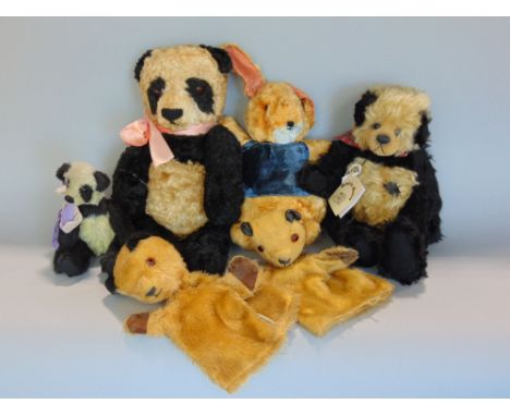 Collection of vintage toys including two Chad Valley Sooty puppets, a plush bunny, a Beatrix Bear panda with jointed limbs an