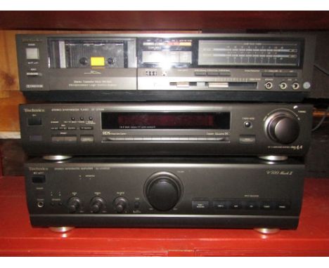 A collection of stereo equipment comprising a Techniques ST-GT500 Stereo Synthesizer Tuner and an RS-B25 Stereo Cassette Deck