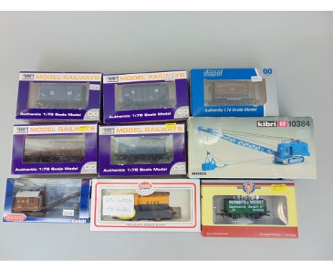 Collection of 9 boxed railway models including 5 Dapol wagons, a Corgi die cast GWR Drag Shovel, a Kibri crane, etc