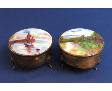 Two similar 1920s silver jewellery vitrine type boxes, each fitted with a decorative enamel lid, one with a marine scene the 