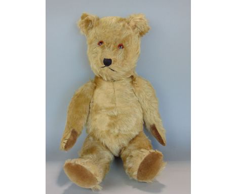 1940s Chiltern teddy bear, 20" tall with glass eyes, stitched nose, mouth and claws, jointed limbs and velveteen paw pads