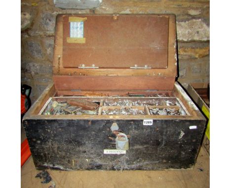 A vintage stained wooden tool chest and contents
