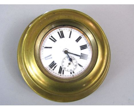 Bulkhead watch type movement, with brass casing, fitted with an enamel dial with Roman numerals and subsidiary second dial an