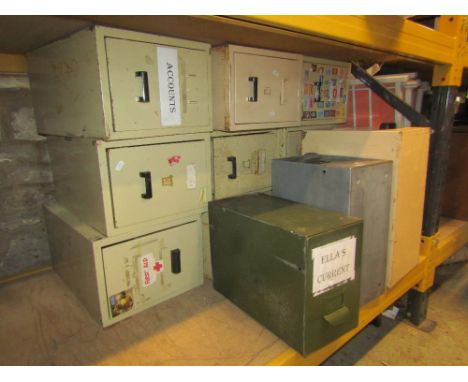 Ten vintage cream painted steel filing drawers, together with two others and a tin trunk (13)