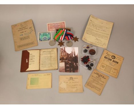 The War II medals and ephemera of 6018828 Private John David Andrews, 1939-45 France and Germany Star, Defence and War Medal,