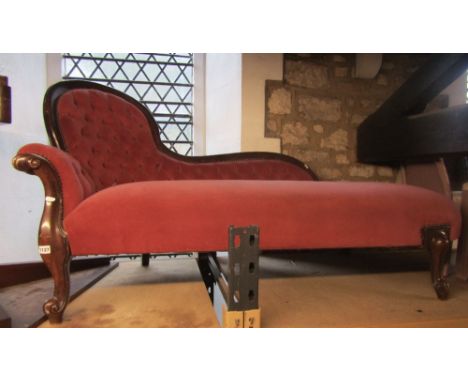 A Victorian style chaise with upholstered seat button spoonback and show wood supports