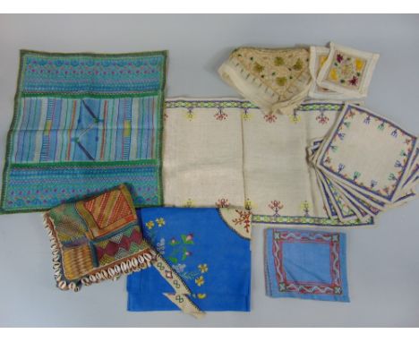 Set of embroidered place mats in cross stitch made in 1930 at Bownville School of Art, together with vintage textiles includi