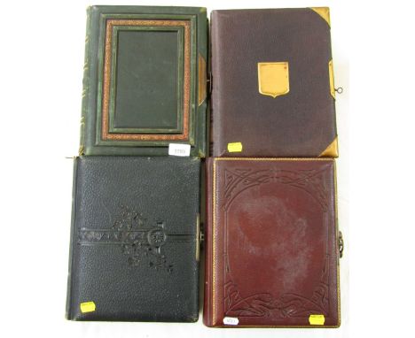 Four Victorian albums, one containing a collection of children's portraits, a further portrait with a USA tax stamp and a lat