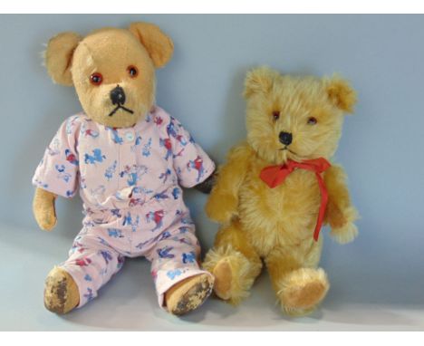 Baby Chiltern teddy bear, 10" tall with golden fur, amber eyes, stitched mouth and nose, jointed limbs and velvet paw pads, t