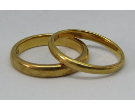Two 22ct wedding rings; size K &amp; L, 7.6g total