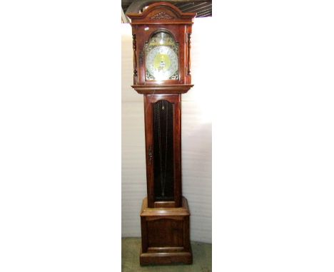 A reproduction longcase/grandmother clock, the moulded case with arched hood and dial with silvered chapter ring, Roman numer