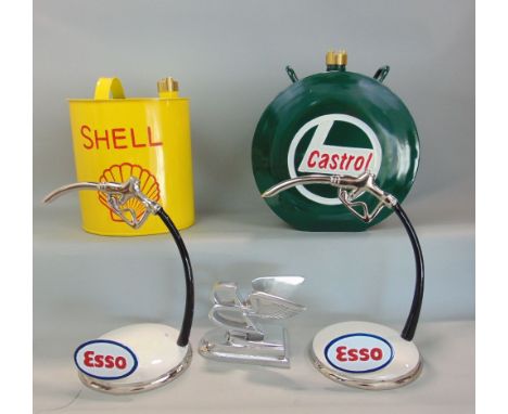 A collection of car memorabilia to include reproduction fuel canisters for Shell and Castrol, two cast metal petrol pump scul