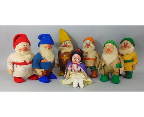 A collection of seven vintage Chad Valley Dwarves, together with an associated Snow White figure of later date, each dwarf ap