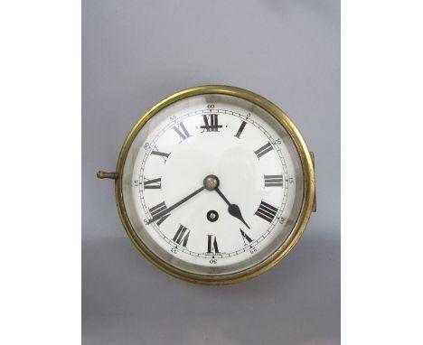 Brass cased bulkhead single train wall clock, 20cm diameter