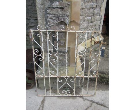 Two sections of reclaimed iron work railing with central scrollwork panels, the longest 205cm long approx, together with furt
