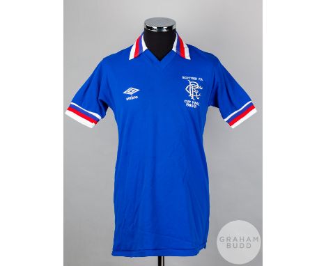 Alex Miller blue No.2 Rangers v. Dundee United short-sleeved shirt, 1981, Umbro, 40in with v-neck collar and embroidered badg