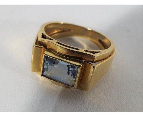 A lady's yellow gold gold ring stamped .750 (indicating 18 carat) set with aquamarine, approx 7.13 gm (all in), size L + 1/2 