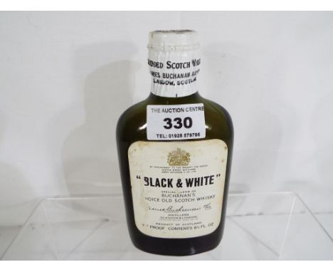 Black & White special blend of choice old Scotch Whisky, James Buchanan & Co, probably 1950s bottling, greeen bottle with sea